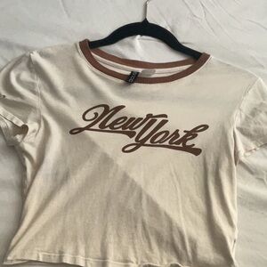 “new york” tan and brown crop top